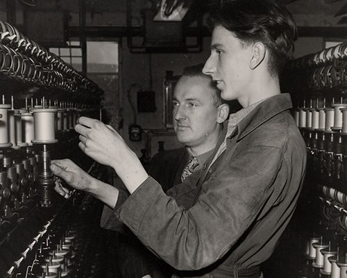 Two men working in silk mill