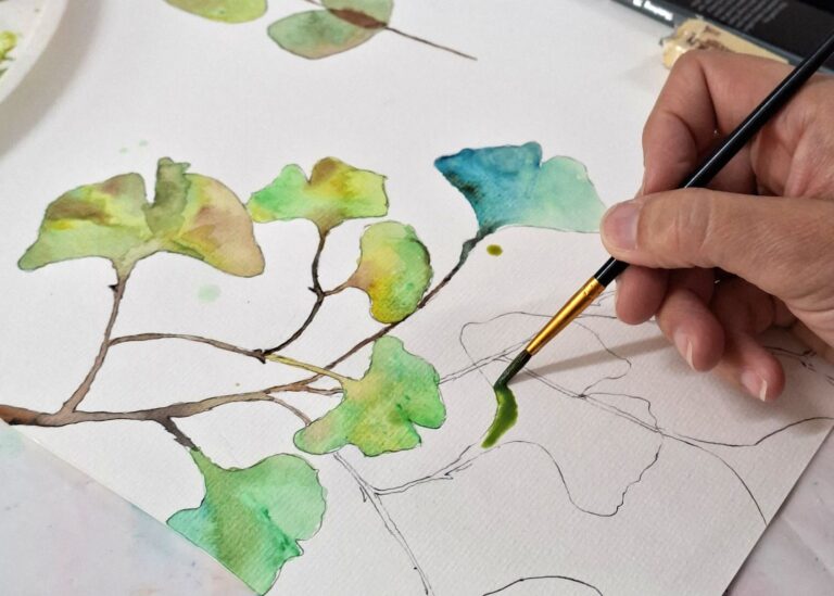 Watercolour painting for textile collection, with a long stem and blue and green fan shape leaves